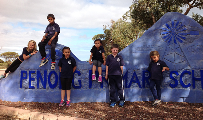 children standing at the penong sign
